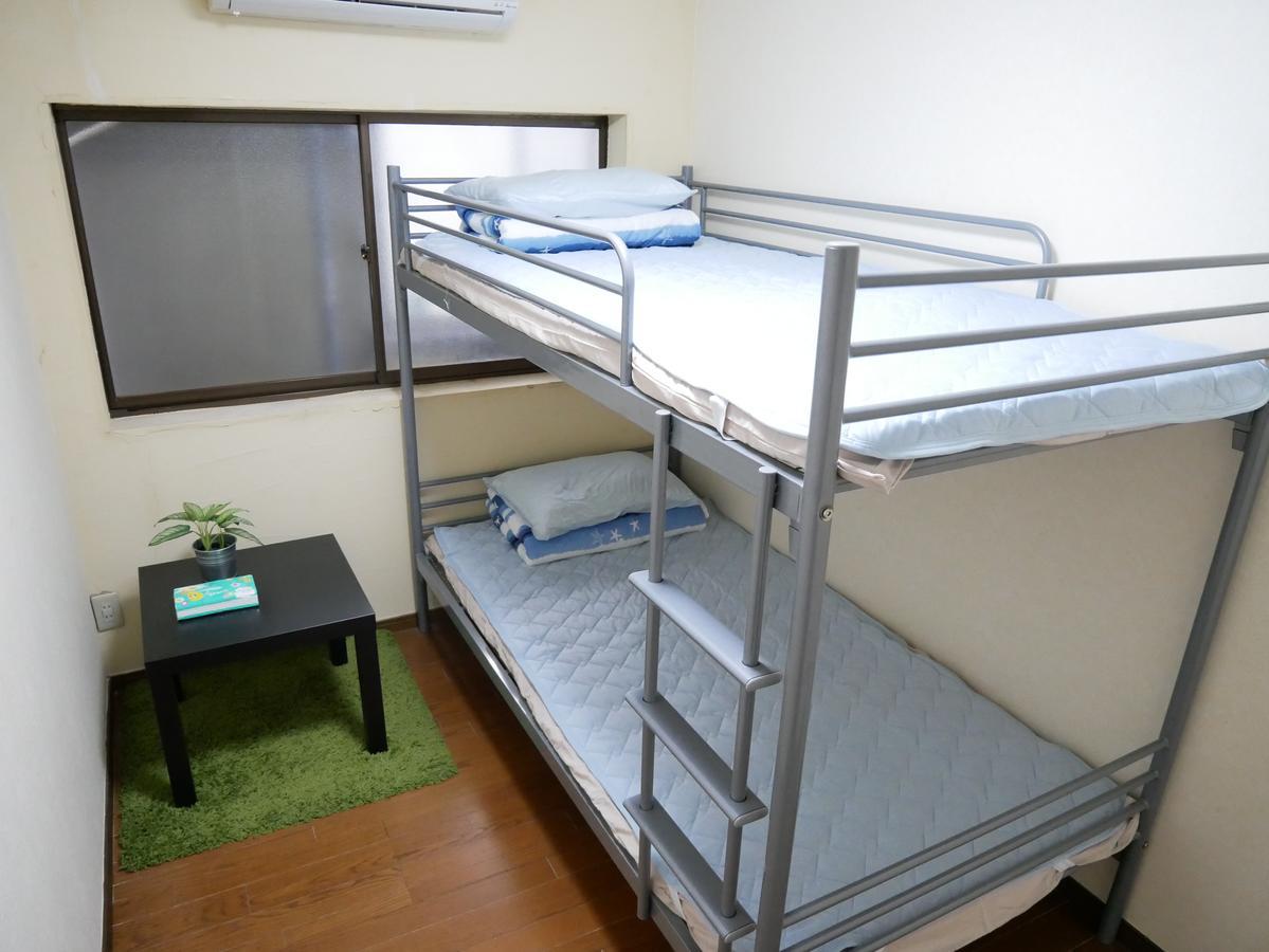 Guest House Twenty-Seven 27 Osaka Bagian luar foto